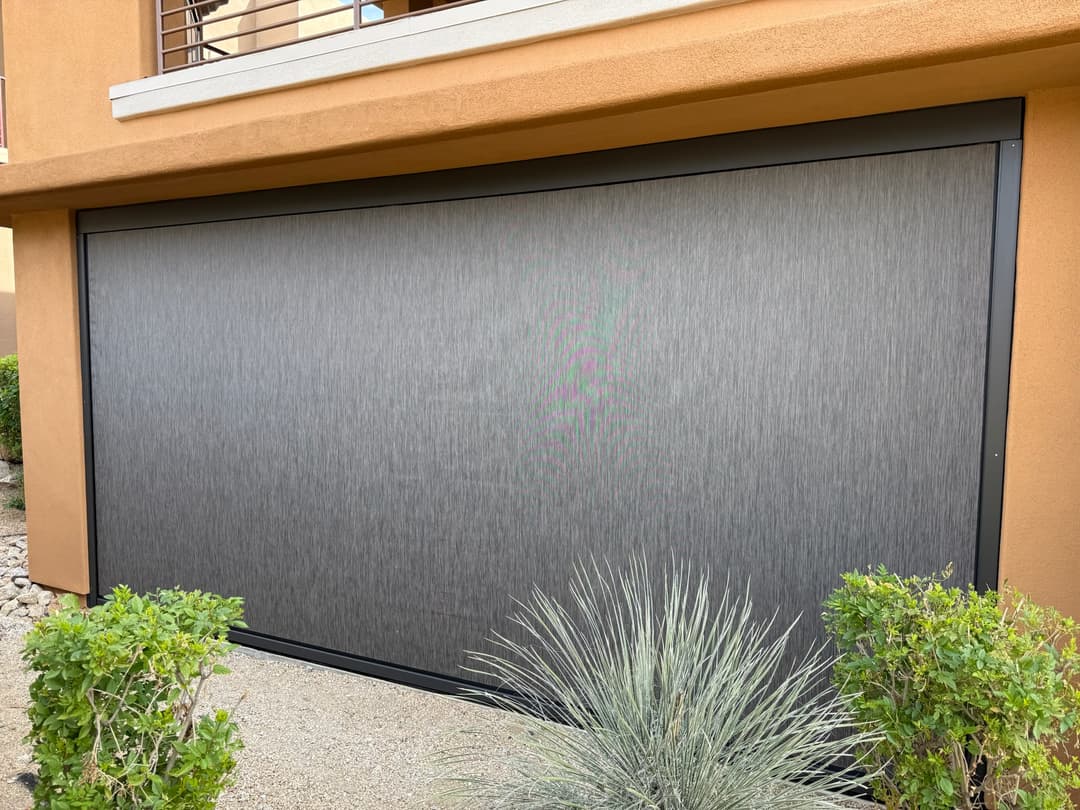 Designer exterior shade lowered on a Phoenix poolside patio