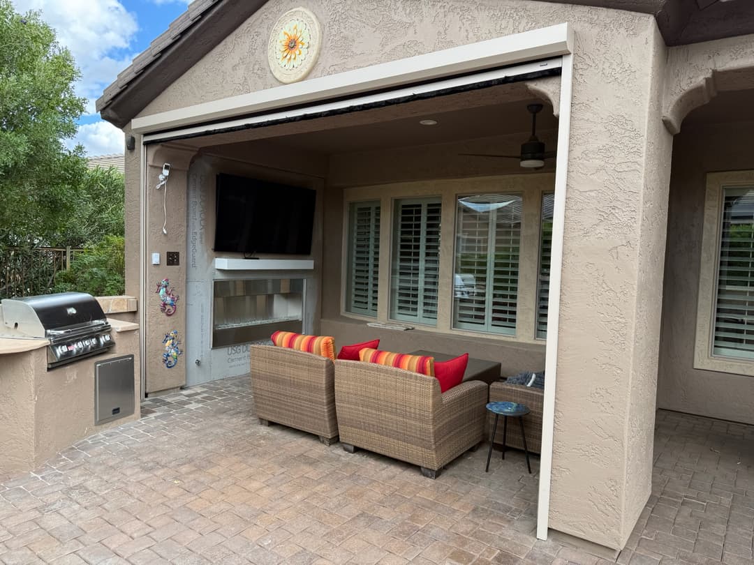 Patio shade with white hardware matched to a Phoenix home's exterior