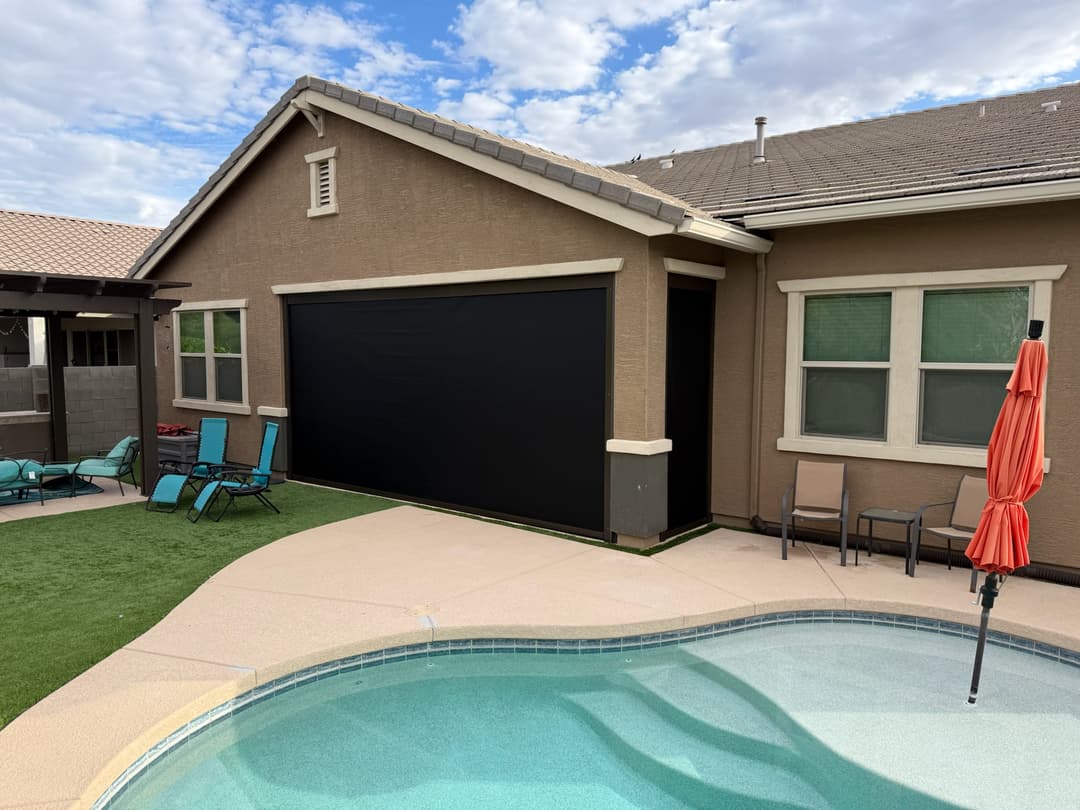 Dark exterior drop shades, near a pool in Phoenix AZ