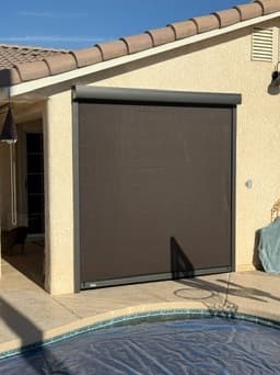 Poolside drop shade lowered on a Phoenix patio