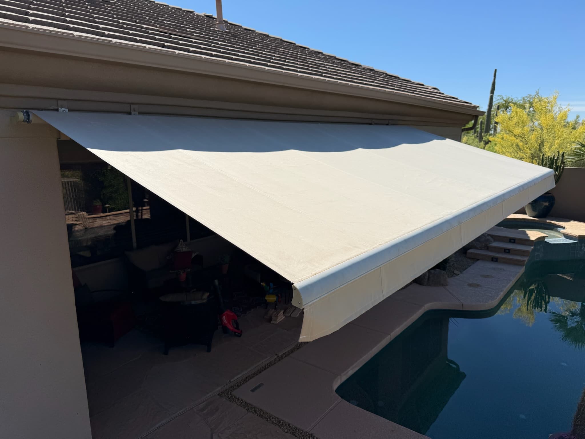 White awning receiving maintenance service