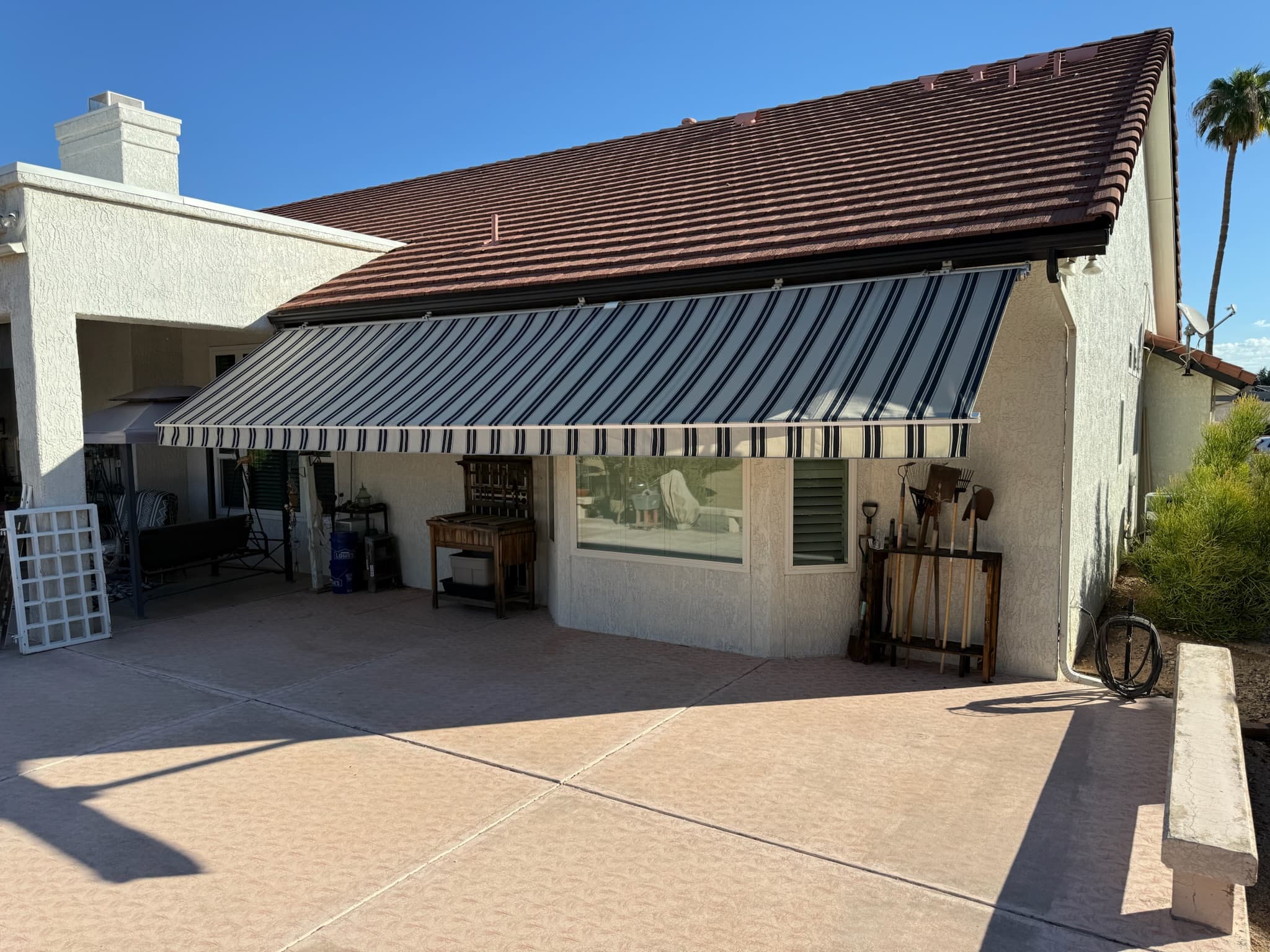 Retractable patio awning providing shade at a Phoenix home